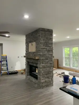 Kitchen Expansion with Dual-Sided Fireplace, Lighting, and Flooring — Home Renovation & Remodeling Services project by Riverstone Construction And Home Improvement
