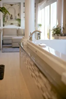 Primary Bedroom, Bathroom, and Spa Area — Home Renovation & Remodeling Services project by Three Four Builders