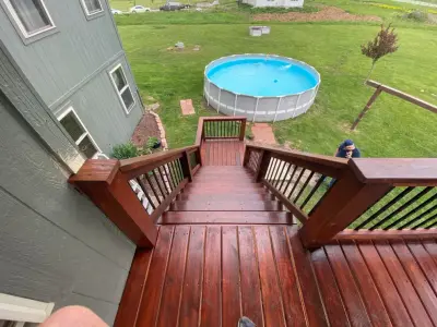 Contemporary Sheltered Upper-Level Deck — Home Renovation & Remodeling Services project by XP Construction