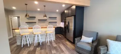 Bespoke Stone Kitchen Bar — Home Renovation & Remodeling Services project by Norse Construction, LLC