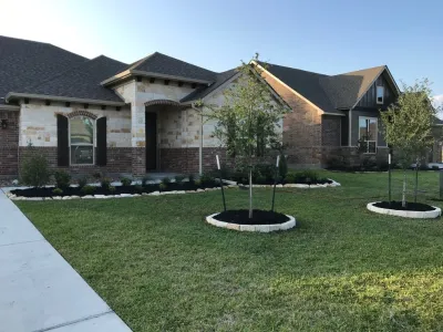 Limestone Flowerbed Edging with New Plantings — Landscape Design project by Sunrise Landscapes