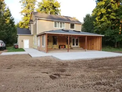 Outdoor Kitchen and Garage Expansion — Home Renovation & Remodeling Services project by AC Burton Homes