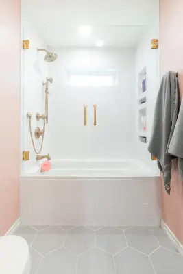 Ella's Blush Bathroom: Lake Highlands by Stringer Construction & Design