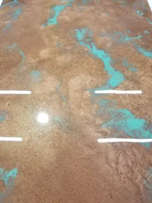 Copper and Patina Epoxy Flooring — Home Renovation & Remodeling Services project by Roman Electric & Construction