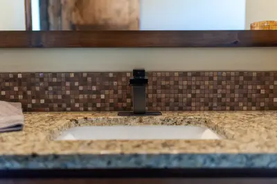 Tailored Rustic Restrooms by Premier Quality Homes INC