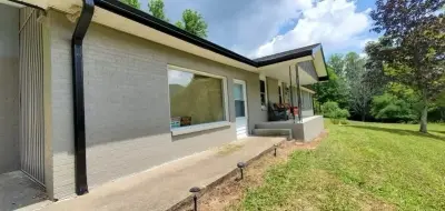 Outdoor Cladding, Window, and Gutter Installation — Home Renovation & Remodeling Services project by Roofing Exteriors Pro