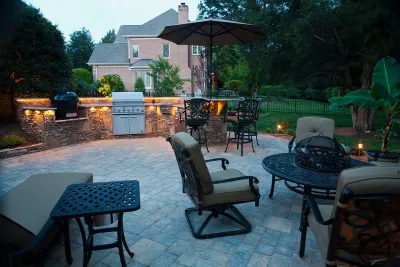 Outdoor kitchen, Lighting and Patio by Terranova Landscapes & Designs Inc.