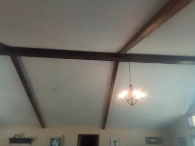 Simulated Ceiling Beam Installation and Molding — Home Renovation & Remodeling Services project by Higgs Homes