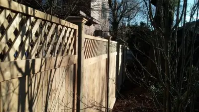 6-foot Cedar tongue and groove panel framed with diagonal lattice topper on 5x5 posts — Fence Installation project by All American Fence Company