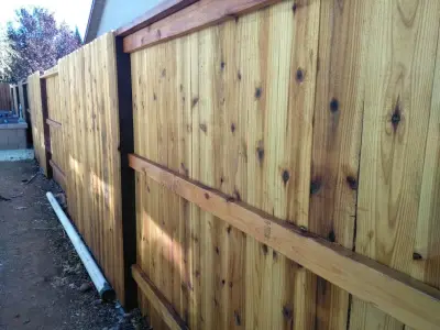 Three Rail Dog-Eared Neighbor-Friendly Barrier — Fence Installation project by Cox Fencing