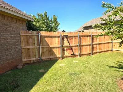 Six-foot cedar fence with steel supports — Fence Installation project by Legacy Fence