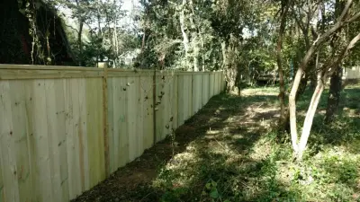 Raised Posts Fence with Cap and Trim by A-1 Fence & Deck Company