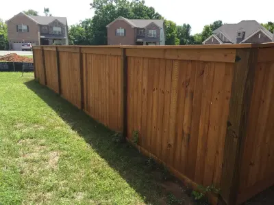 Desert Sand Stain on Table Top Privacy Fence in Spring Hill, TN — Fence Installation project by Stain & Seal Experts