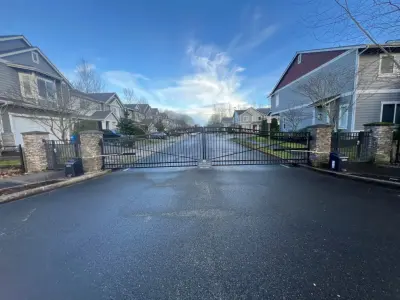 Installation of Dual Swing Gates in a New Gated Community in Vancouver, WA — Fence Installation project by Evergreen Electric Gates NW LLC