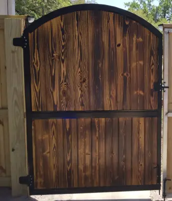 Custom Decorative Gate with Concealed Vehicle Access Completed — Fence Installation project by Hunter's Woods Outdoors