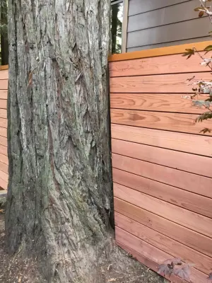 Redwood Horizontal Fence with Larkspur Design — Fence Installation project by Clough Construction