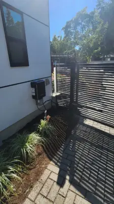 Contemporary dual swing gate setup in Kirkland, WA — Fence Installation project by Evergreen Electric Gates NW LLC