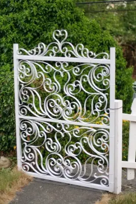 Ivory Scroll Portal — Fence Installation project by Carbon & Sand