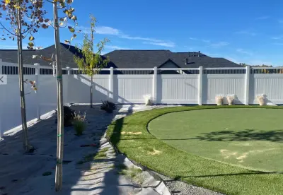 Spindle Top White Vinyl Garden Fence — Fence Installation project by High & Tight Fencing