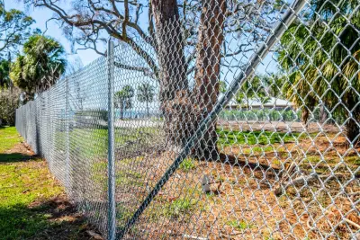 Custom Sarasota Home Builder's Temporary Construction Fencing and Barricades — Fence Installation project by Freedom Fence & Aluminum