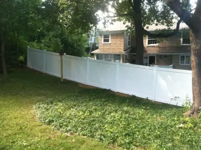 Watertown 6-Foot PVC Privacy Fence with Slope — Fence Installation project by Hartford Fence Company