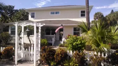 Transforming a Single Story Beach Cottage: Before and After by ArcDesign