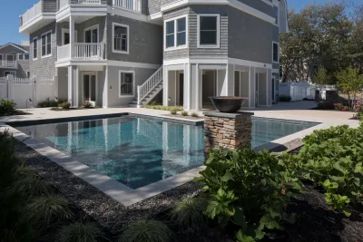 Contemporary Pool and Hardscape by Beechwood Landscape Architecture And Construction