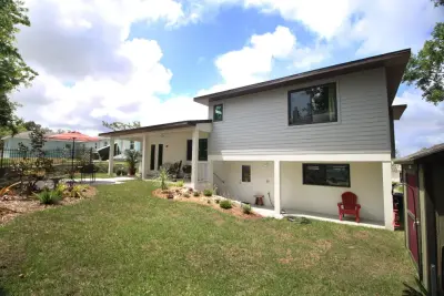 Brevard County Midcentury Split-Level Home with Contemporary Features by Armistead Design & Drafting