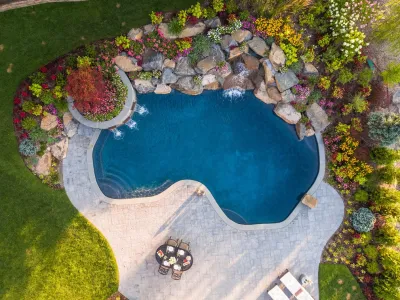 freeform oaisis with a waterfeature and waterfalls in Short Hills NJ — Landscape Design project by Thomas Flint Landscape Design & Development