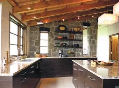 Rustic Kitchen Featuring Stone Accents by Cabinets Etc By Design