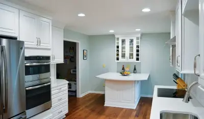 Sleek White Kitchen — Kitchen Remodeling project by Jim Carver & Sons Home Improvements