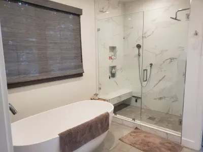 Spa-Inspired Bathroom Renovation in Lake Forest Featuring a Freestanding Tub — Kitchen Remodeling project by USA Home Remodeling