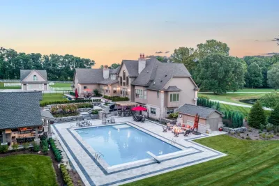 Brighton, MI - Pool Backyard Landscape Design & Install by Troy Clogg Landscape Associates