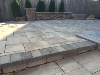 Two Level Patio with Seat Wall & Firepit — Landscape Design project by True North Landscaping