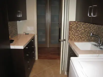 Laundry Space — Kitchen Remodeling project by Kiwi Woodworks