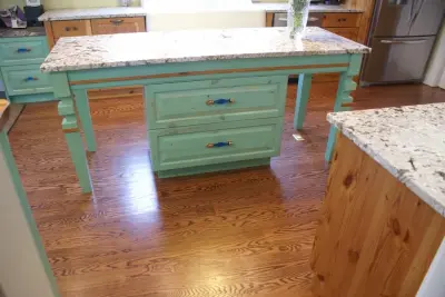 Mary's Vintage Heart Pine Kitchen — Kitchen Remodeling project by Diversified Woods Inc.