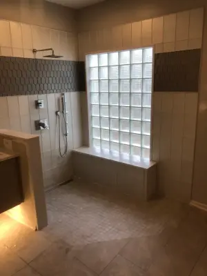 primary bath, half bath, kitchen by Spencer Remodeling