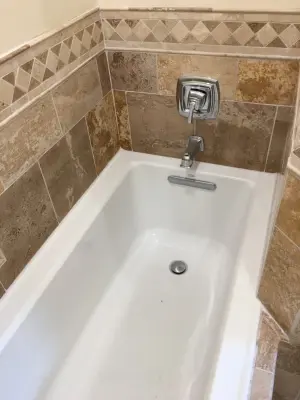 Renovated Layout for Master Bathroom by Spencer Remodeling