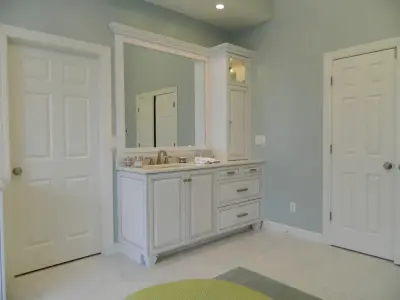 Master Bath with Reflective Cabinets — Kitchen Remodeling project by Lorrien Homes & Remodeling