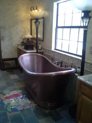 Mediterranean-Inspired Bathroom by J&K Construction