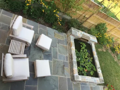 Fish in the Fountain — Landscape Design project by Bethesda Garden Design Llc in Washington