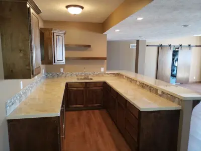 Wet Bar in Finished Basement — Custom Home Builders project by Empire Homes And Remodeling Inc.