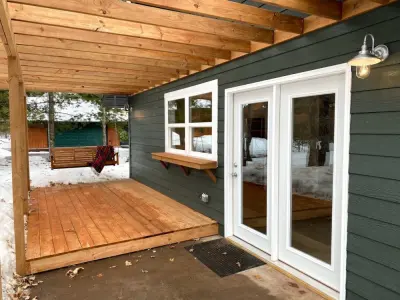 Large Bass Small Cabin — Custom Home Builders project by Northern Paradise Homes