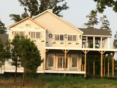 Custom Modular Black Walnut Point — Custom Home Builders project by Safe Harbour Construction, LLC.