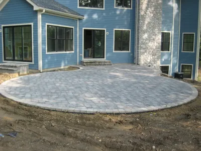 Unilock Brick Patios — Landscape Design project by Whispering Hills Garden & Landscape Design Center in Fox River Grove