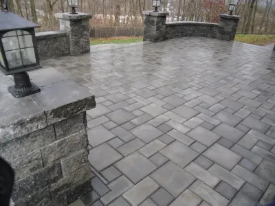EP Henry Paver Patio with Sitting Walls and Pillars by Woodward Landscape Supply