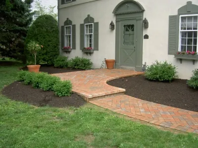 Traditional Brick Sidewalk and Landing — Landscape Design project by Woodward Landscape Supply