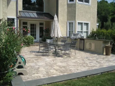 Beautiful Custom Travertine and Flagstone Backyard Patio — Landscape Design project by Woodward Landscape Supply