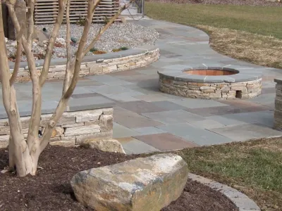 Natural Clef Flagstone Patio - Veener Stone Sitting Walls - Custom Fire Pit — Landscape Design project by Woodward Landscape Supply