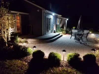 Paver patio with builtin BBQ by Z.O. Landscaping